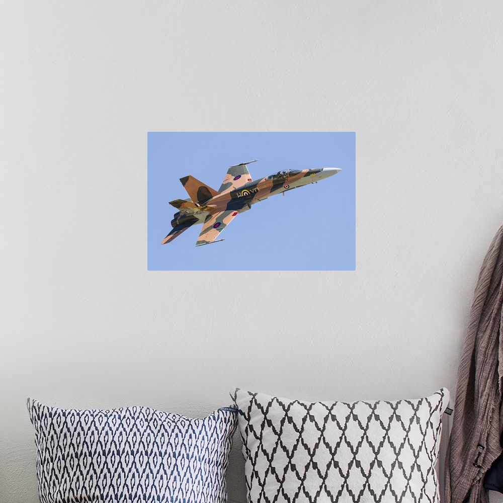 A bohemian room featuring A CF-188 Hornet of the Royal Canadian Air Force in 70th anniversary markings.