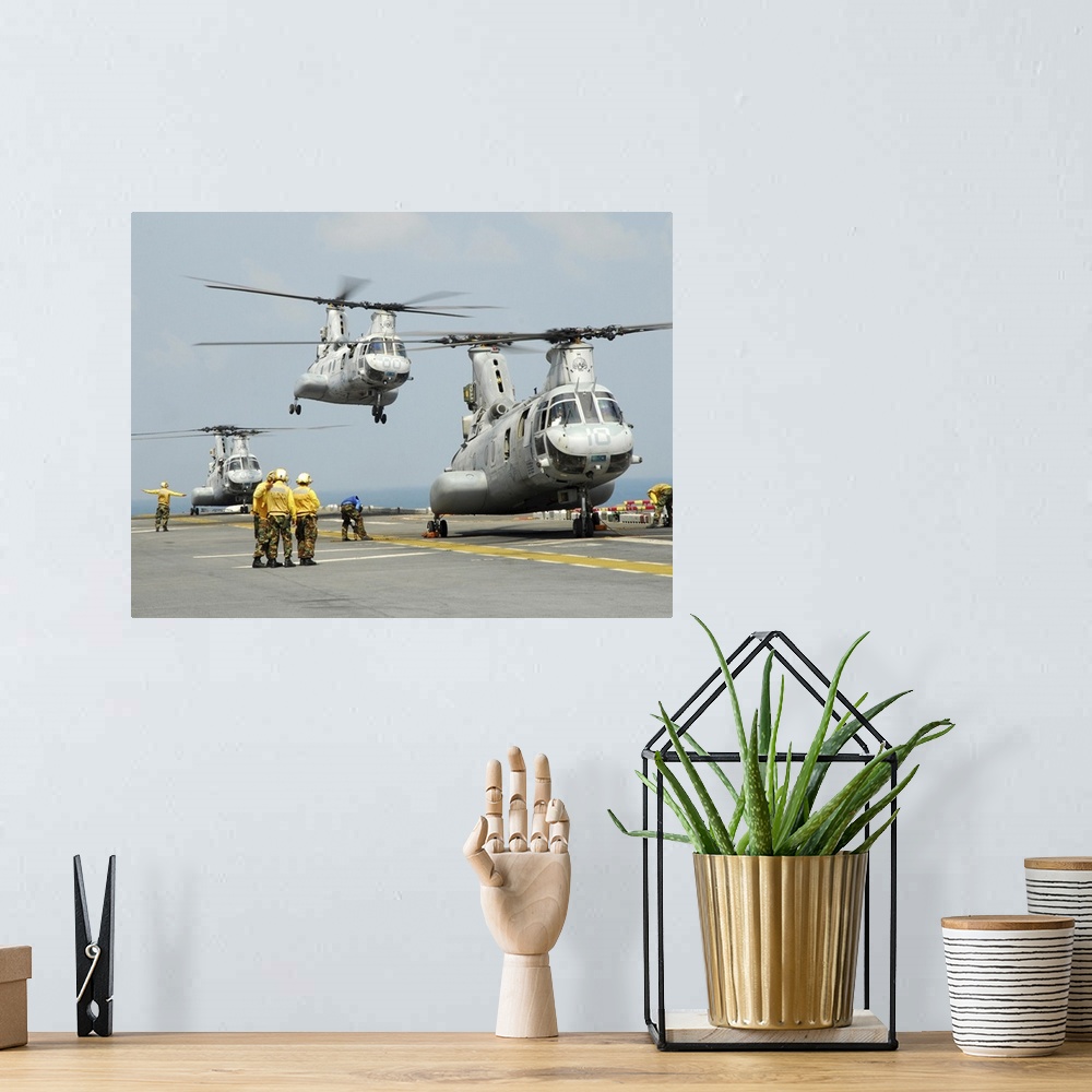 A bohemian room featuring February 13, 2011 - A U.S. Marine Corps CH-46E Sea Knight helicopter takes off from the flight de...