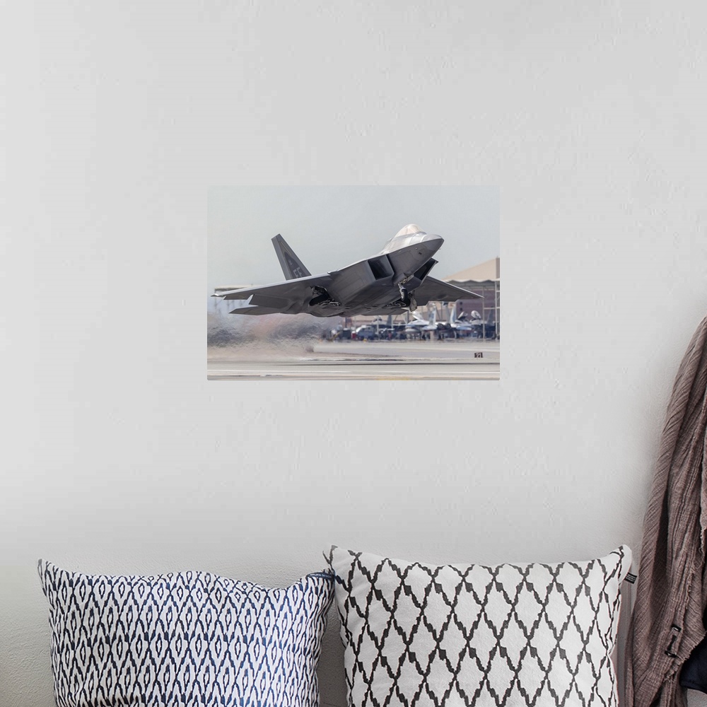 A bohemian room featuring A F-22 Raptor of the U.S. Air Force launches from Nellis Air Force Base, Nevada.