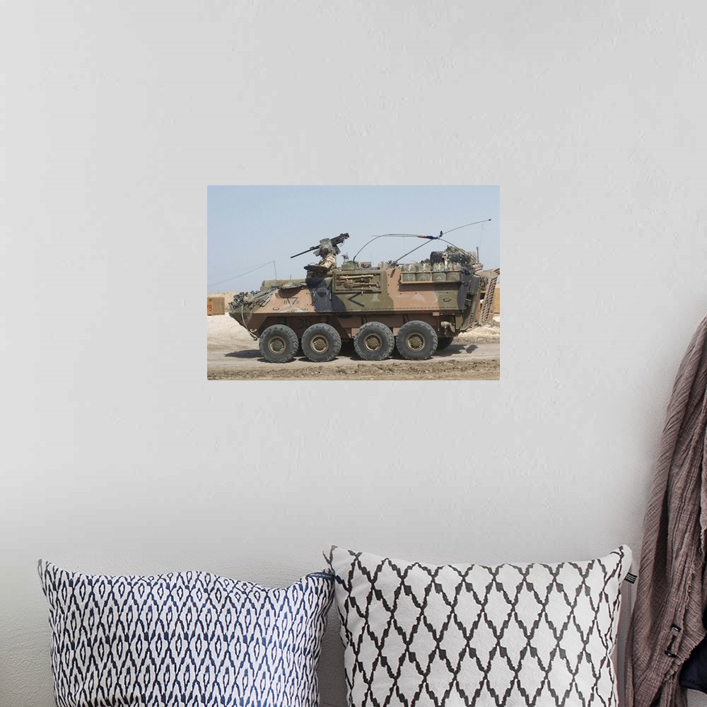 A bohemian room featuring A LAV III infantry fighting vehicle in Afghanistan.