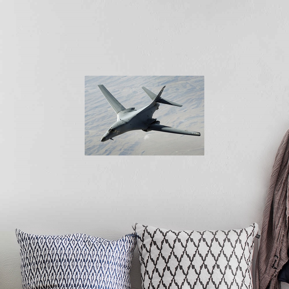 A bohemian room featuring A US Air Force B1B Lancer on a combat patrol over Afghanistan