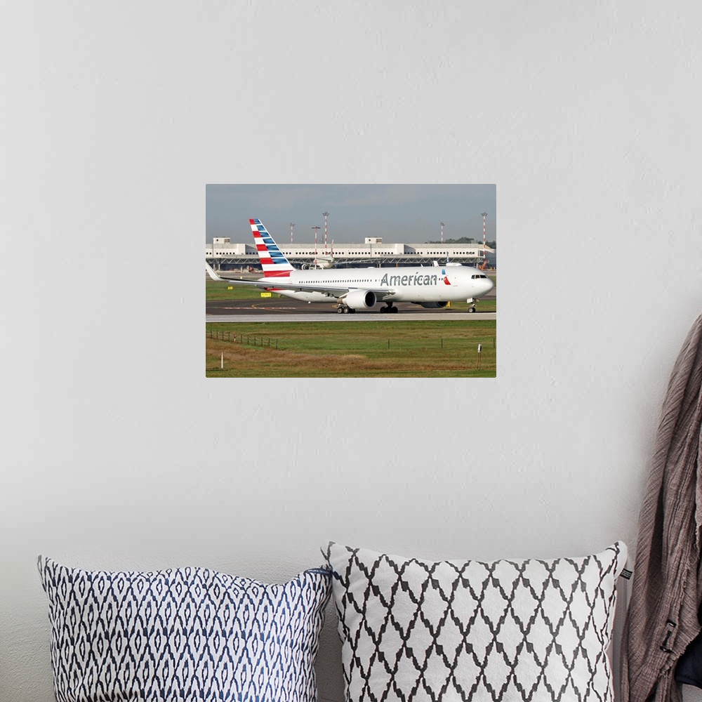 A bohemian room featuring An American Airlines Boeing 767 at Milano Malpensa Airport, Italy.
