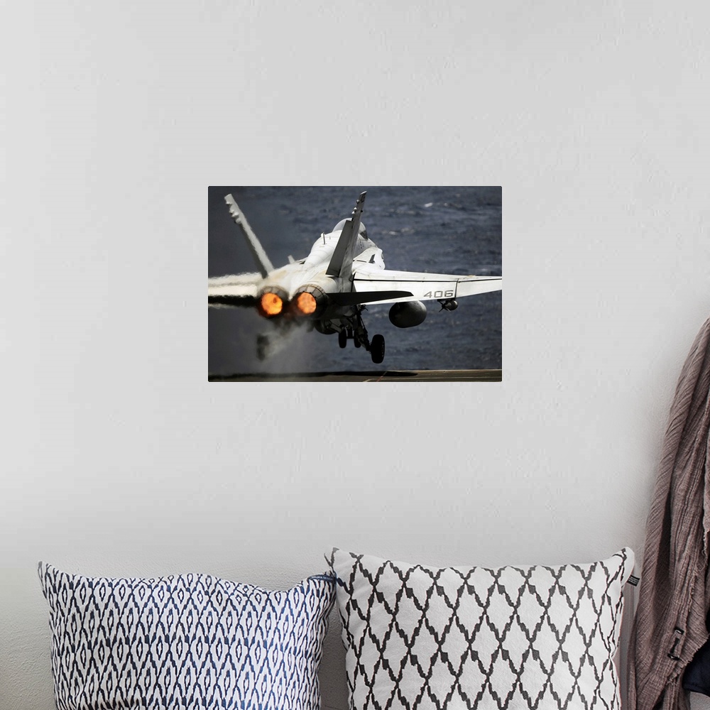 A bohemian room featuring Arabian Sea, May 17, 2012 - An F/A-18C Hornet launches from the Nimitz-class aircraft carrier USS...