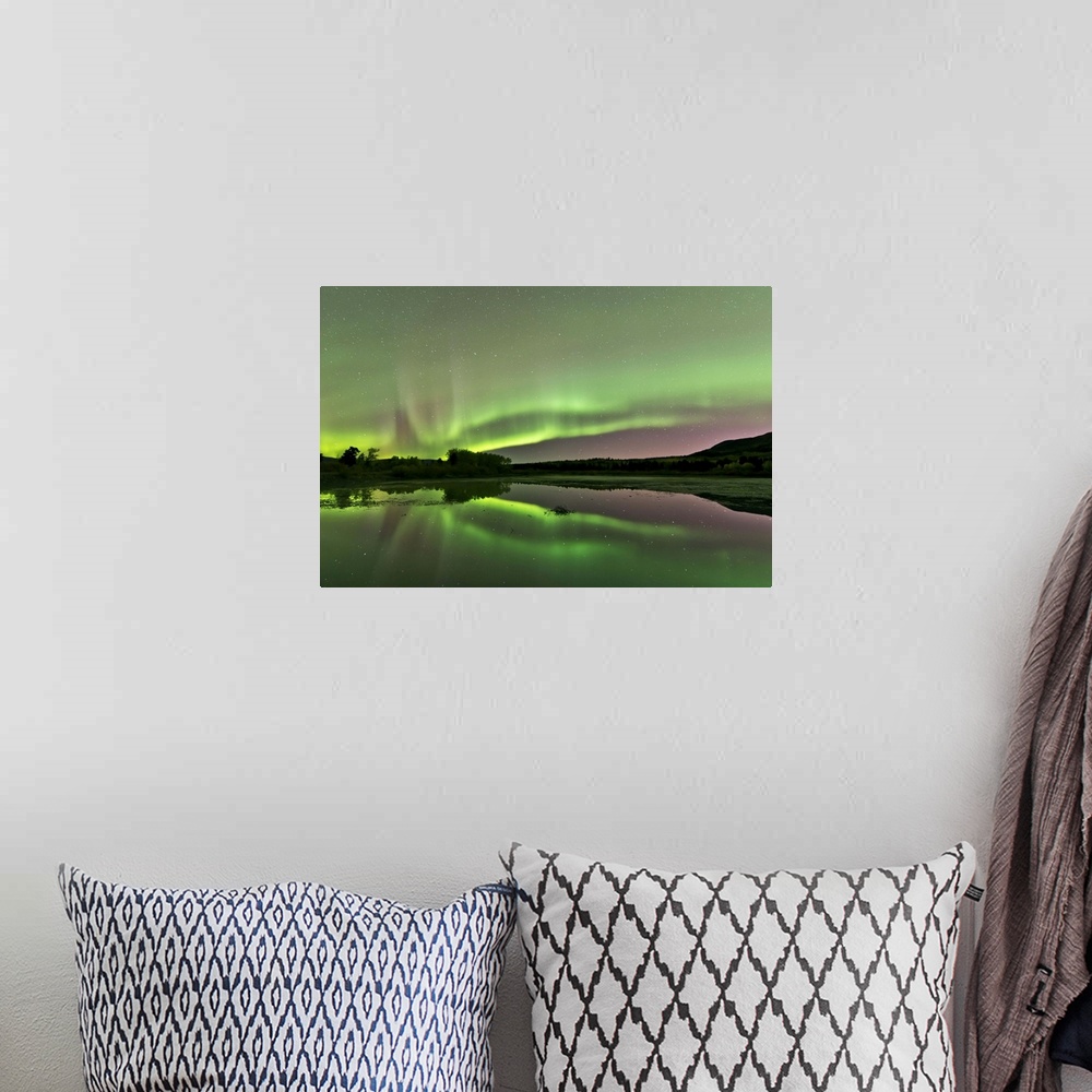 A bohemian room featuring Aurora borealis over Fish Lake, Whitehorse, Yukon, Canada.