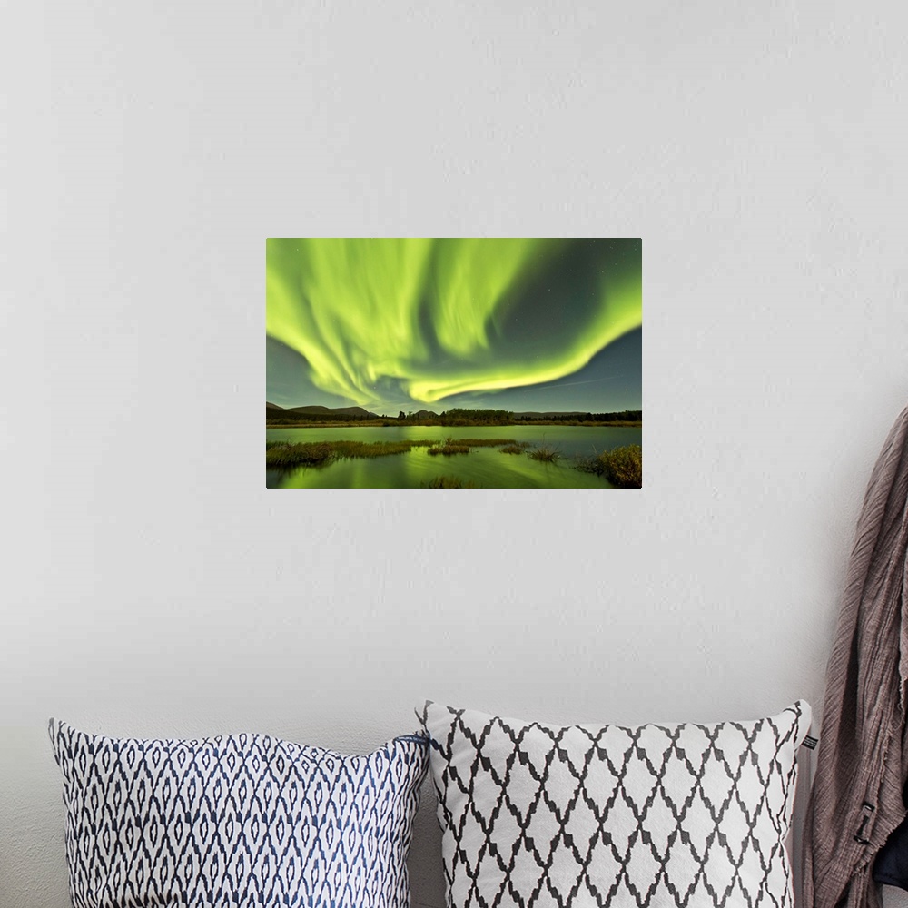 A bohemian room featuring Aurora borealis over Fish Lake, Yukon, Canada.
