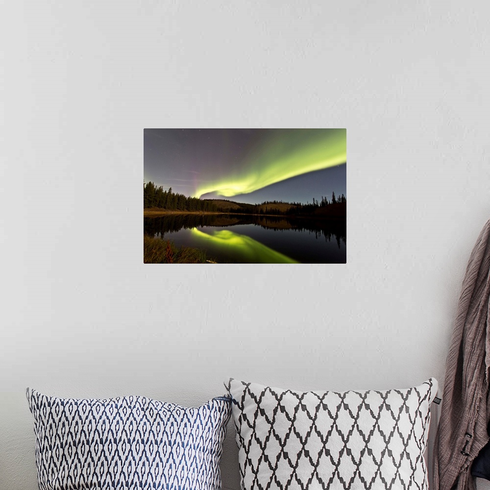 A bohemian room featuring Aurora borealis over Hidden Lake, Yukon, Canada.