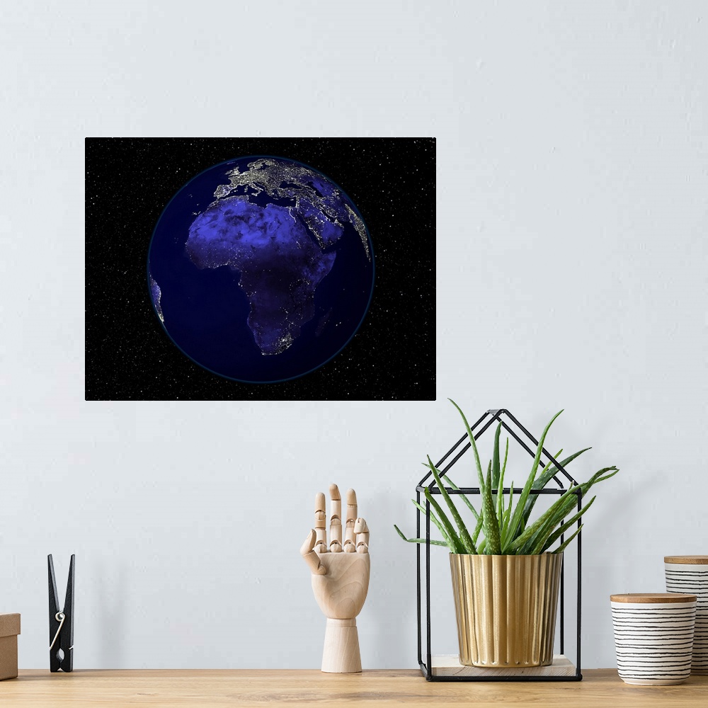 A bohemian room featuring Full Earth at night showing Africa and Europe