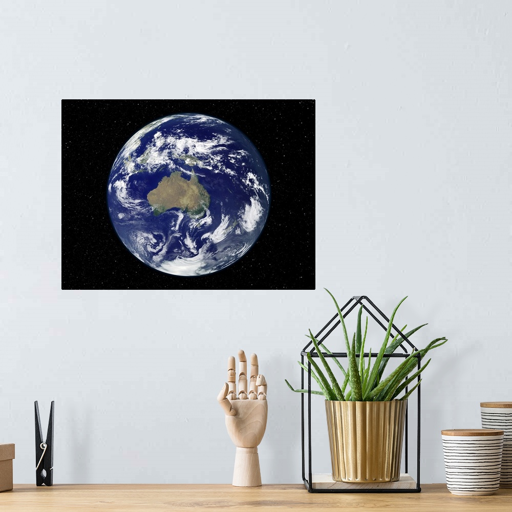 A bohemian room featuring Fully lit Earth centered on Australia and Oceania