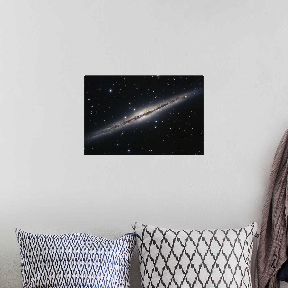 A bohemian room featuring NGC 891, an edge-on spiral galaxy in Andromeda.