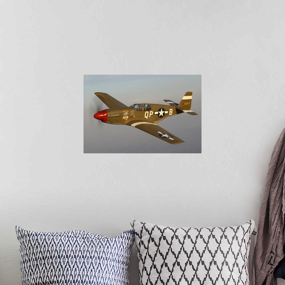A bohemian room featuring P-51C Mustang flying over Chino, California.