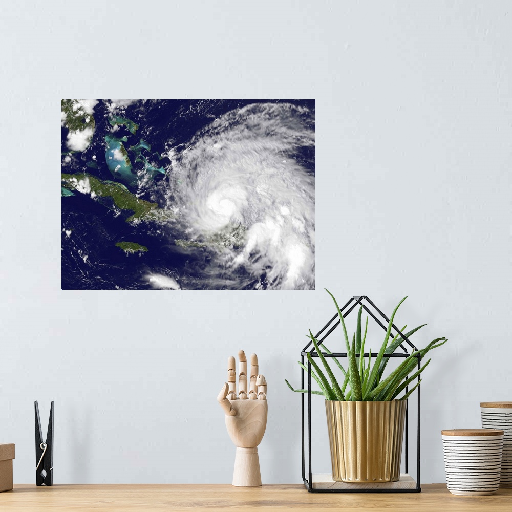 A bohemian room featuring August 23, 2011 - Satellite view of Hurricane Irene approaching the Bahamas. No eye is visible in...