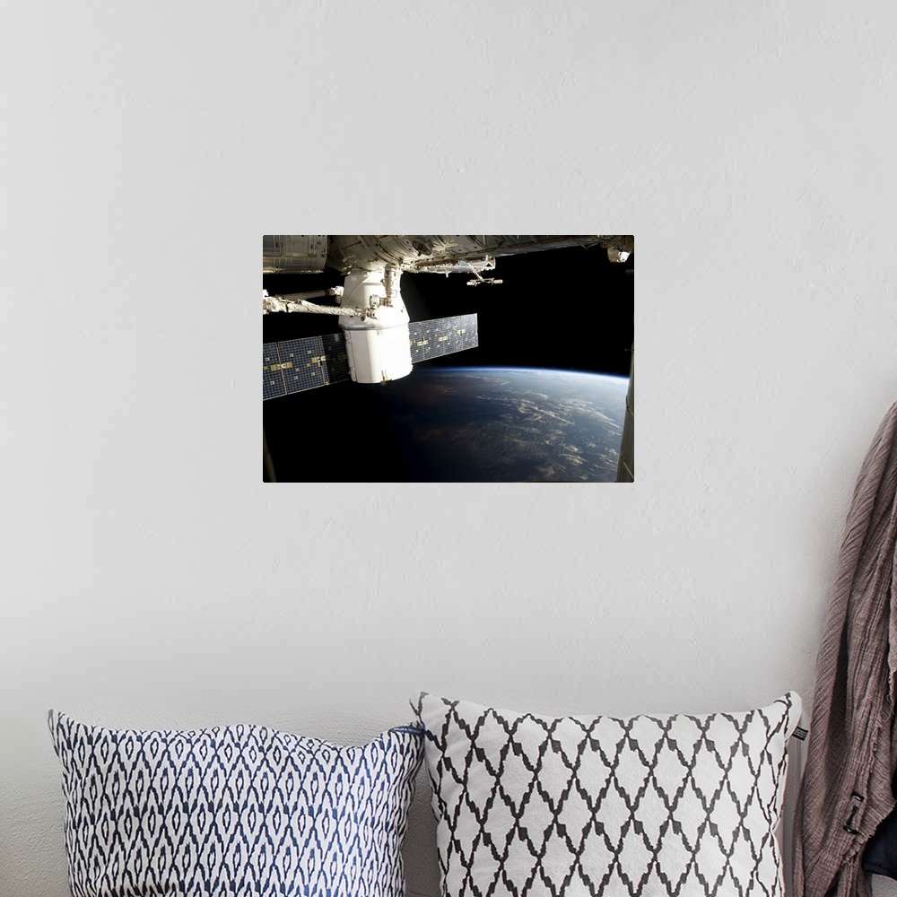 A bohemian room featuring March 3, 2013 - View of the SpaceX Dragon during its approach and docking with the International ...