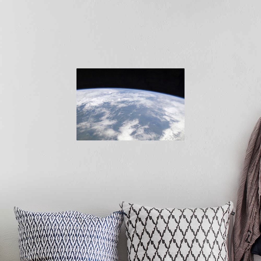 A bohemian room featuring View of planet Earth from space