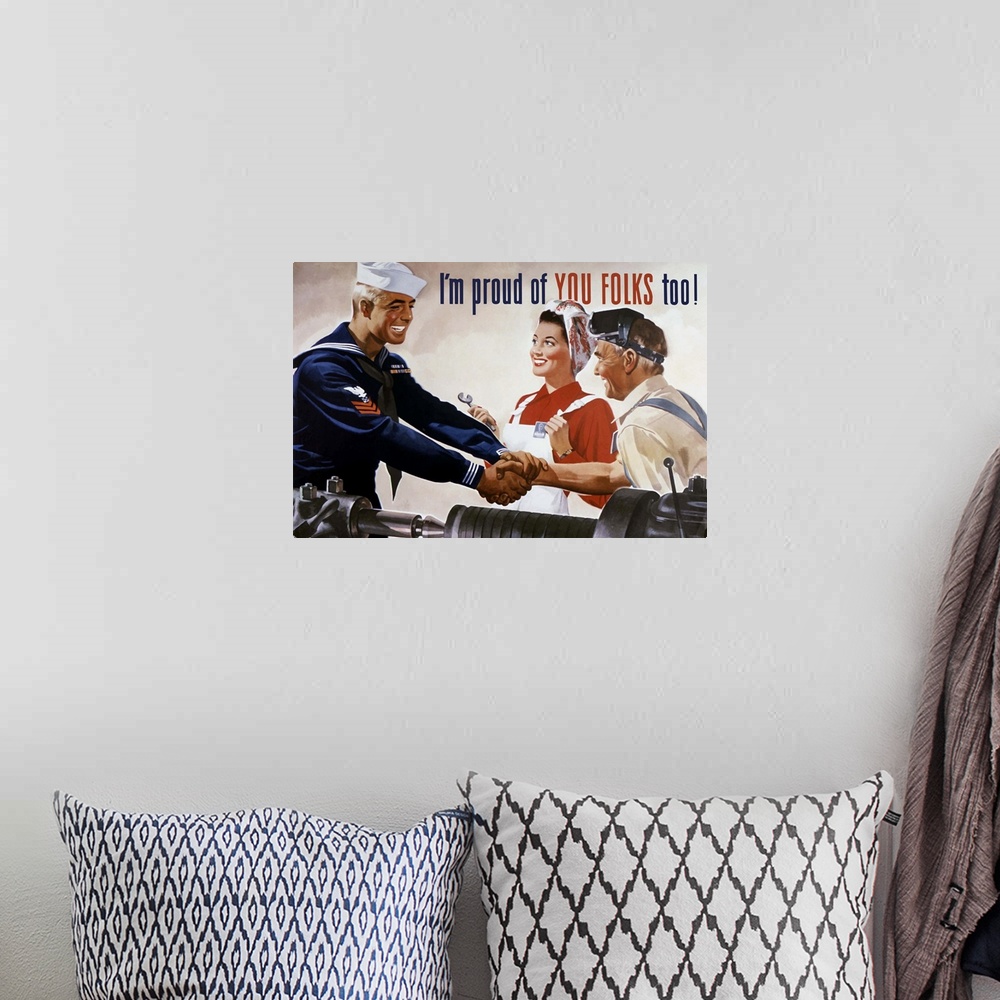 A bohemian room featuring Vintage World War II propaganda poster featuring a sailor shaking hands with two factory workers....