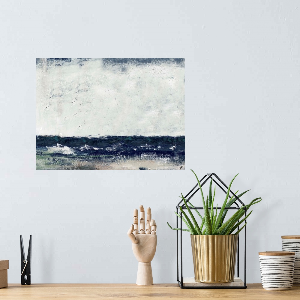 A bohemian room featuring A contemporary abstract painting of the ocean at Cape Cod with dark blues and an overcast sky.