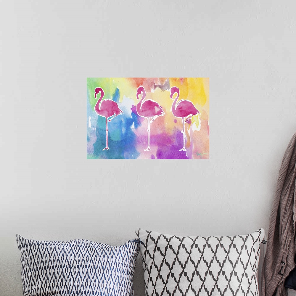 A bohemian room featuring Watercolor painting of three pink flamingo silhouettes on a background made with all of the color...