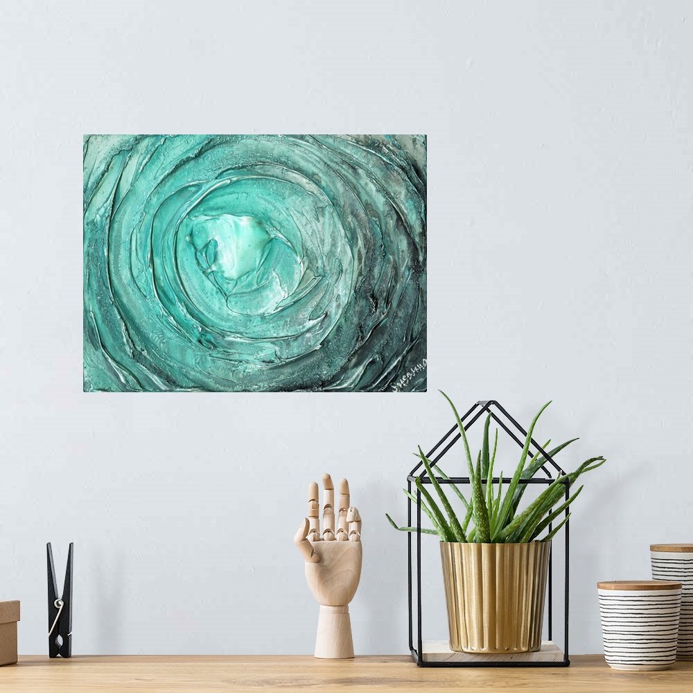 A bohemian room featuring Large abstract painting with thick circular strokes and layers of paint in aqua and silver.