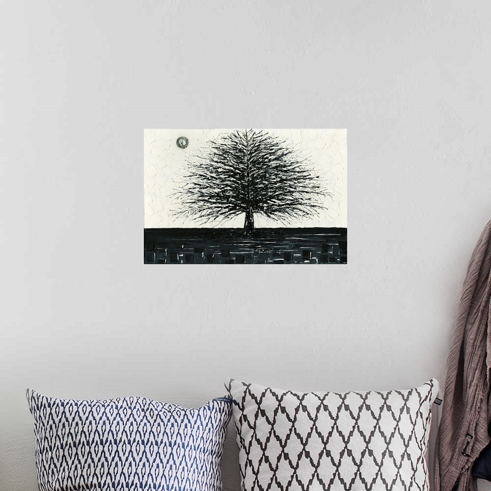 A bohemian room featuring Black and white tree landscape with layers of squares in the background.