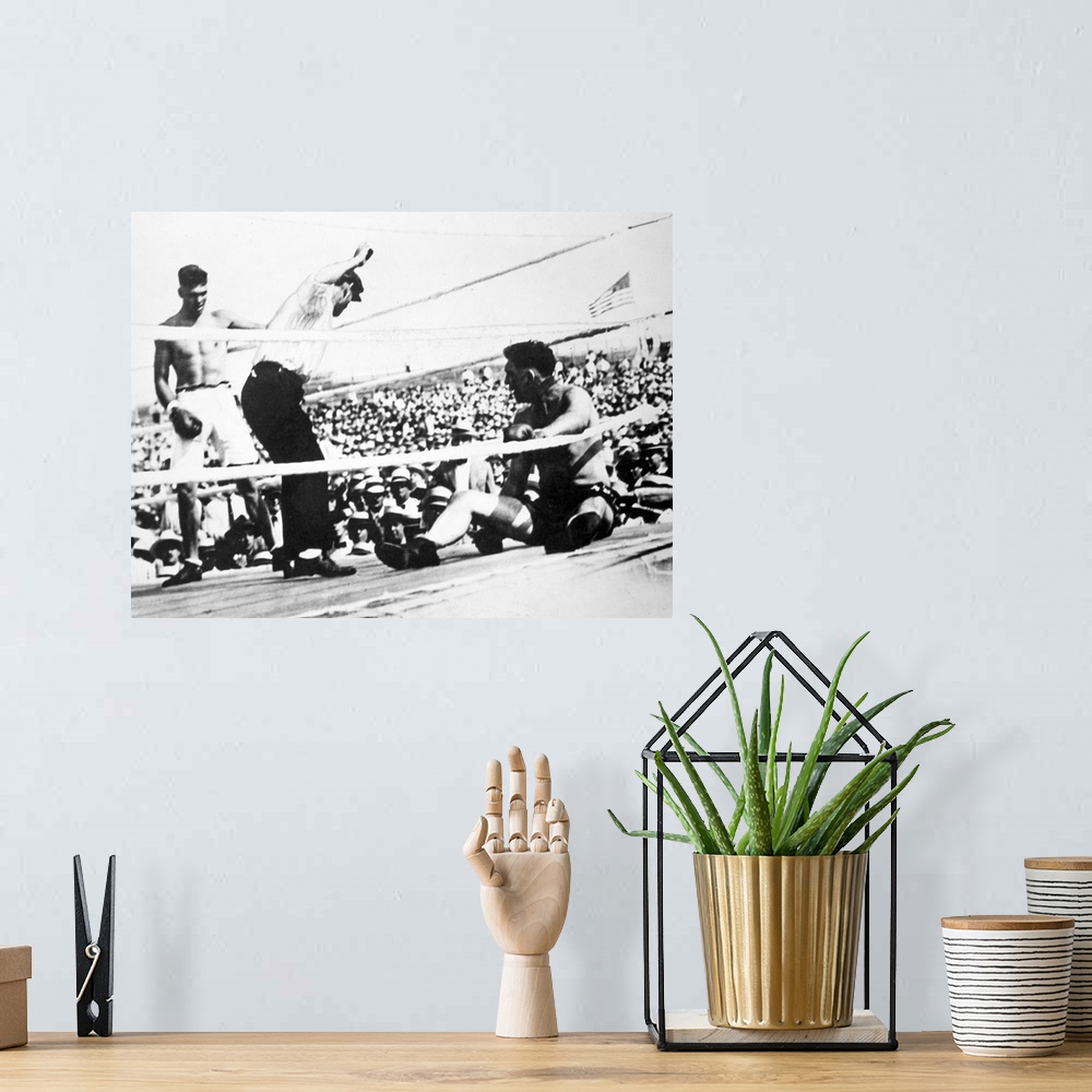 A bohemian room featuring American boxer. Jack Dempsey (left) winning the heavyweight championship from Jess Willard on 4 J...