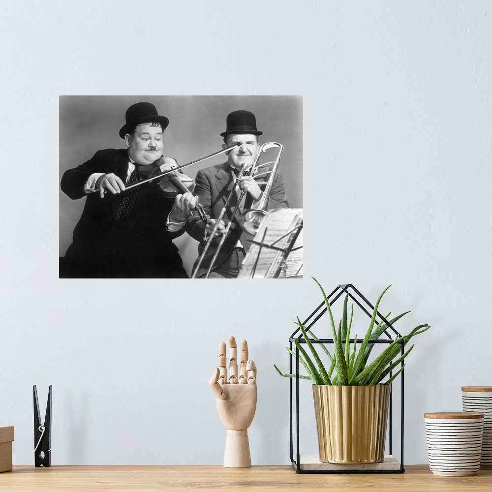 A bohemian room featuring 433.34.LAUREL AND HARDY.