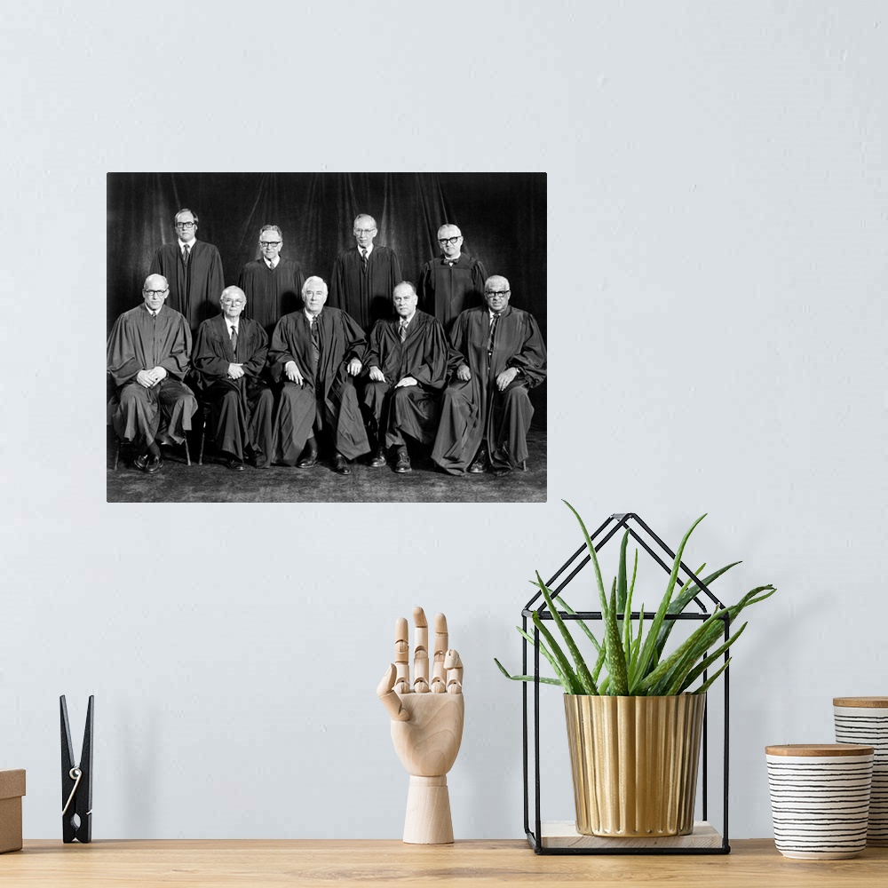A bohemian room featuring SUPREME COURT, 1976. Portrait of Justices William J. Brennan, Jr., Bryon R. White, Harry A. Black...
