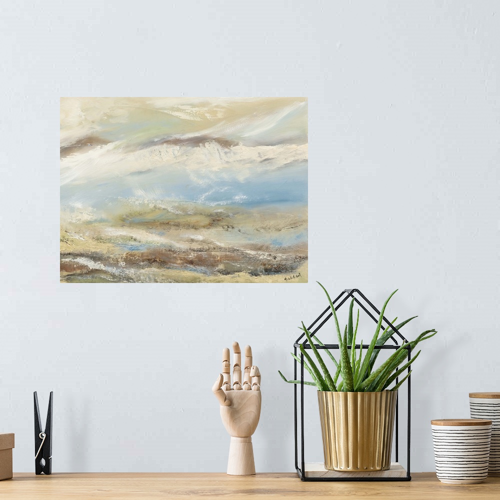 A bohemian room featuring Abstract painting representing a beach landscape with earth tones and texture.