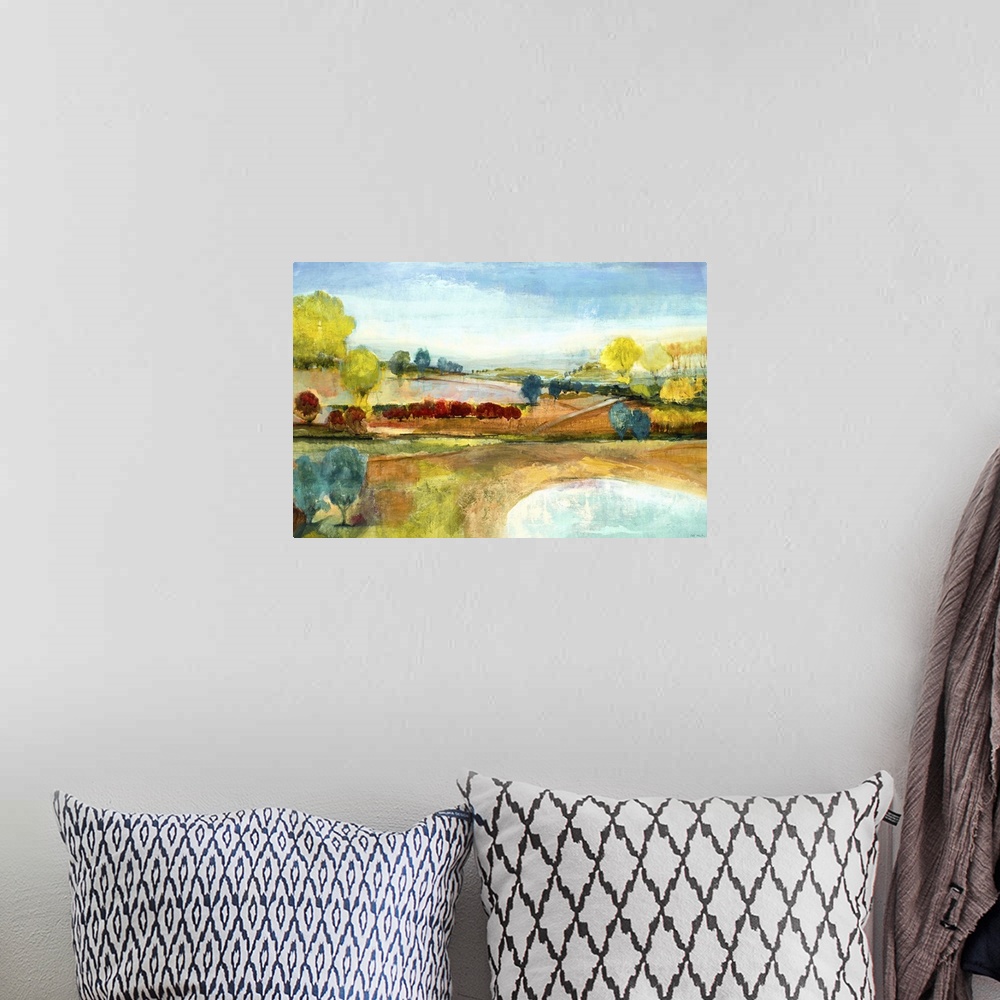A bohemian room featuring Contemporary landscape painting looking out rolling countryside.