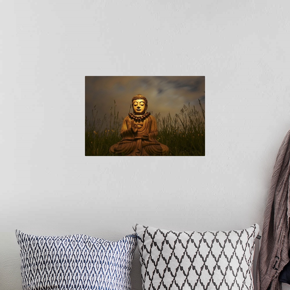 A bohemian room featuring A bhudda in long grass