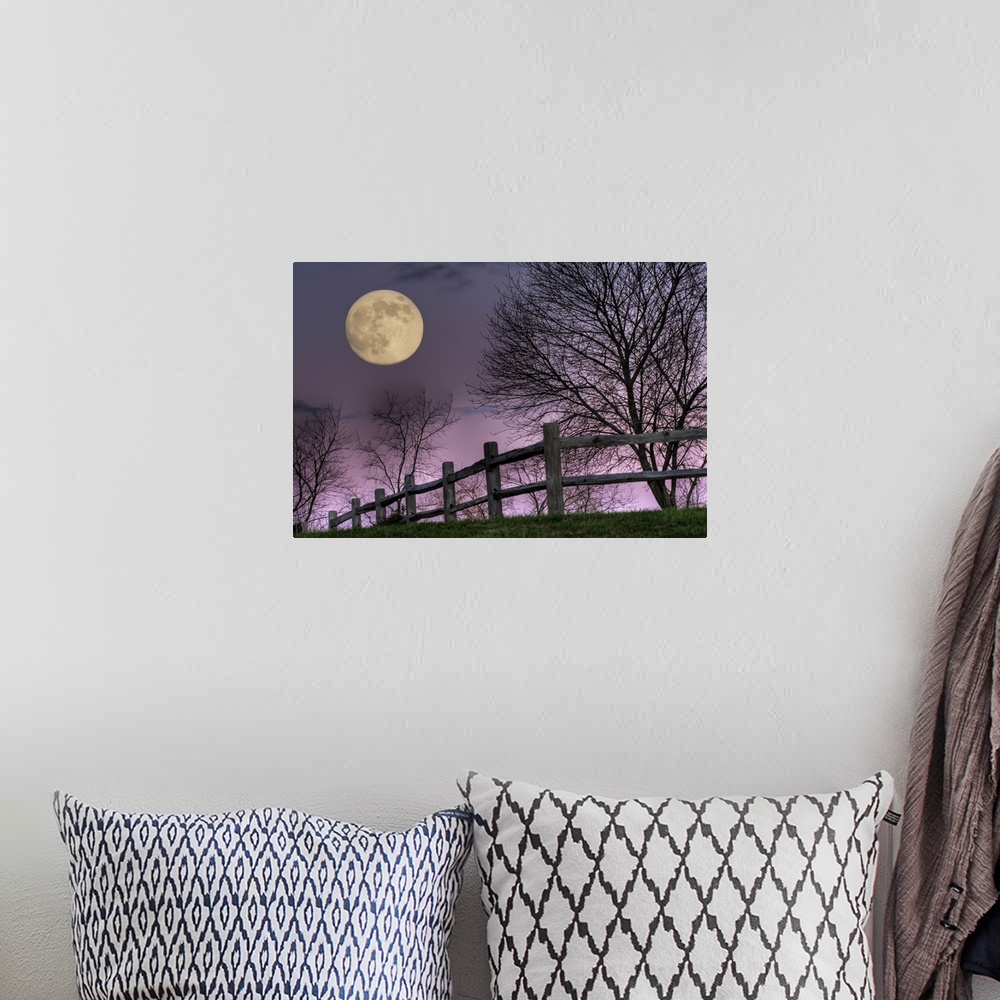 A bohemian room featuring November Moon rising over hill at Inn at Cedar Falls in Hocking Hills