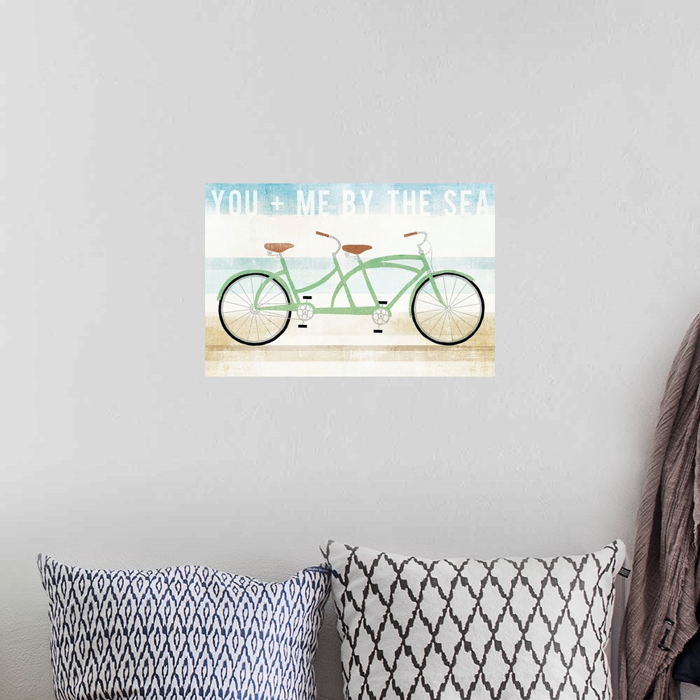 A bohemian room featuring "You   Me By The Sea" with an illustration of a green tandem bicycle on a blue, white, and tan ba...