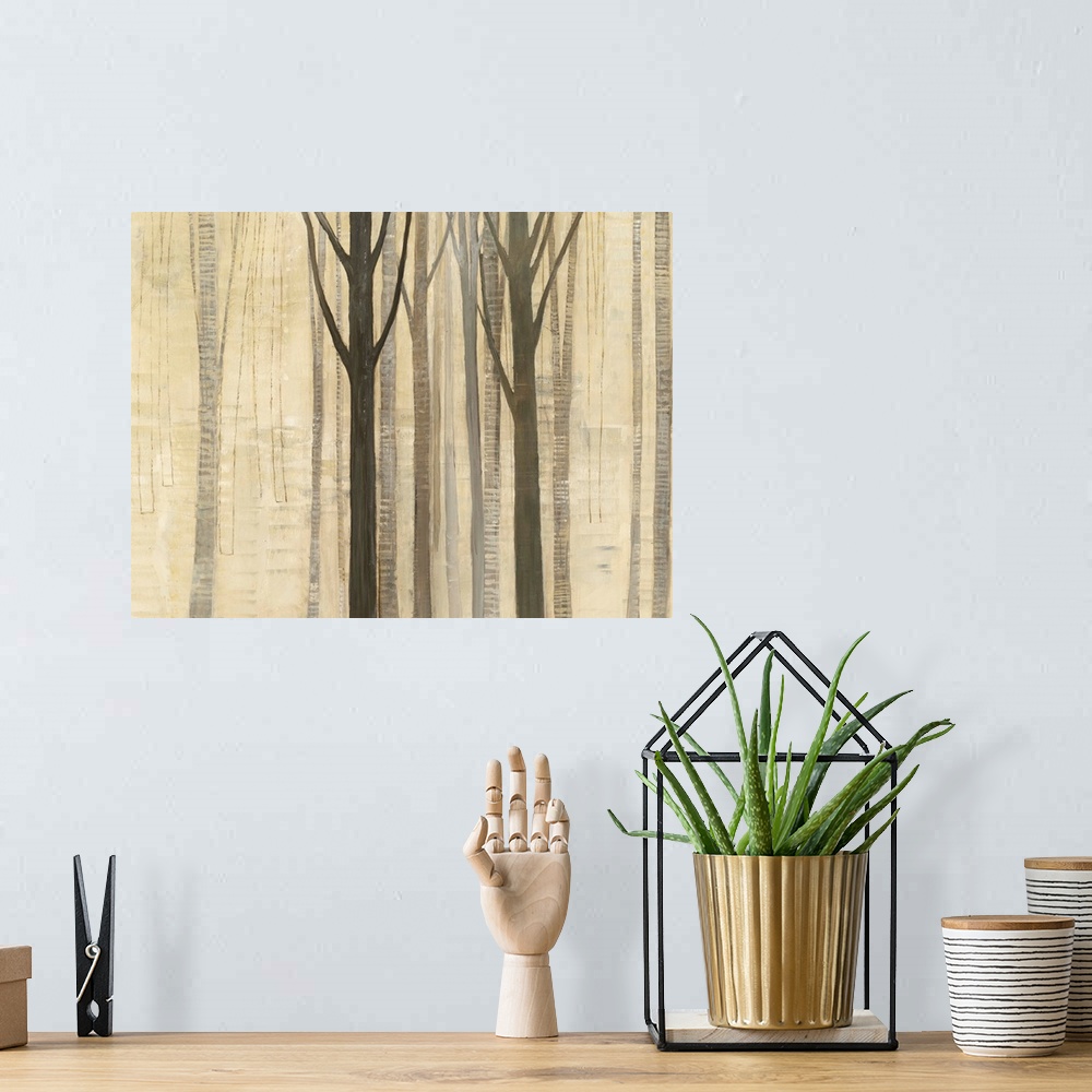A bohemian room featuring Painting of tall trees in a forest in neutral tones.