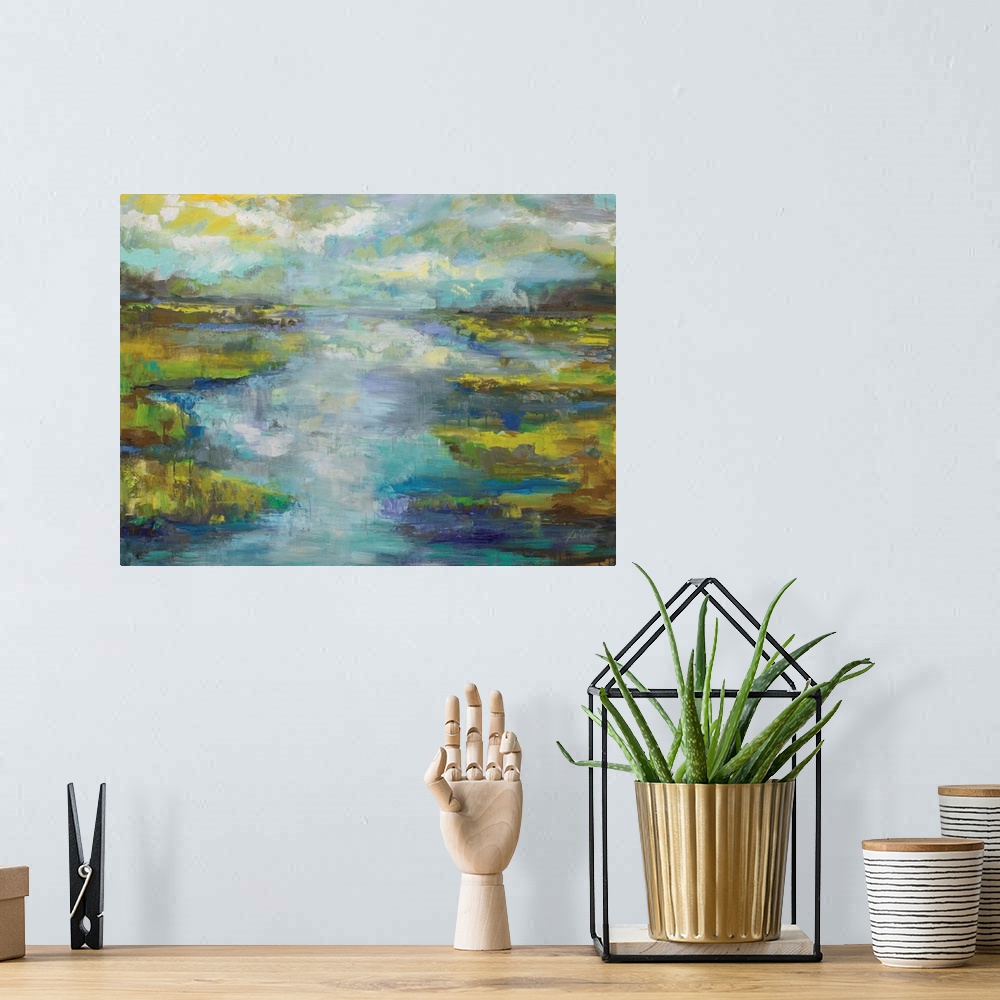 A bohemian room featuring Contemporary painting of a stream running through a landscape.