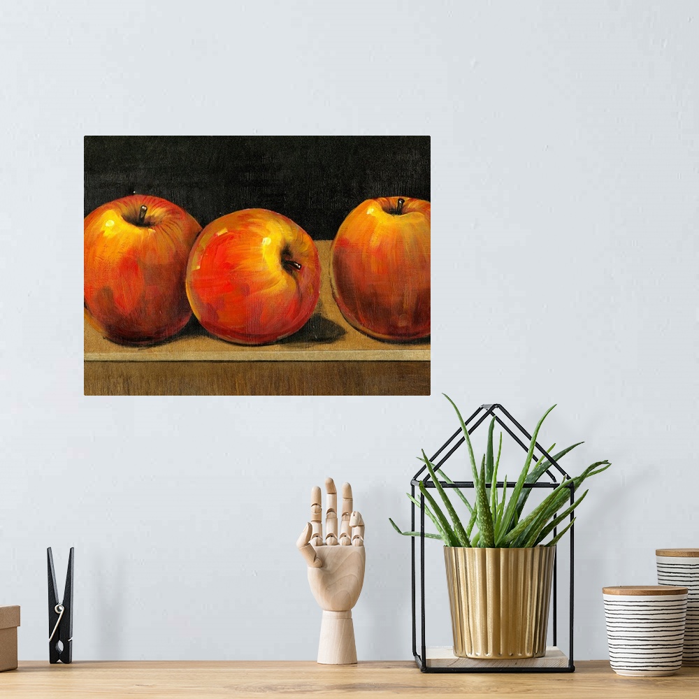 A bohemian room featuring Big still life painting of three apples sitting on a desk on canvas.
