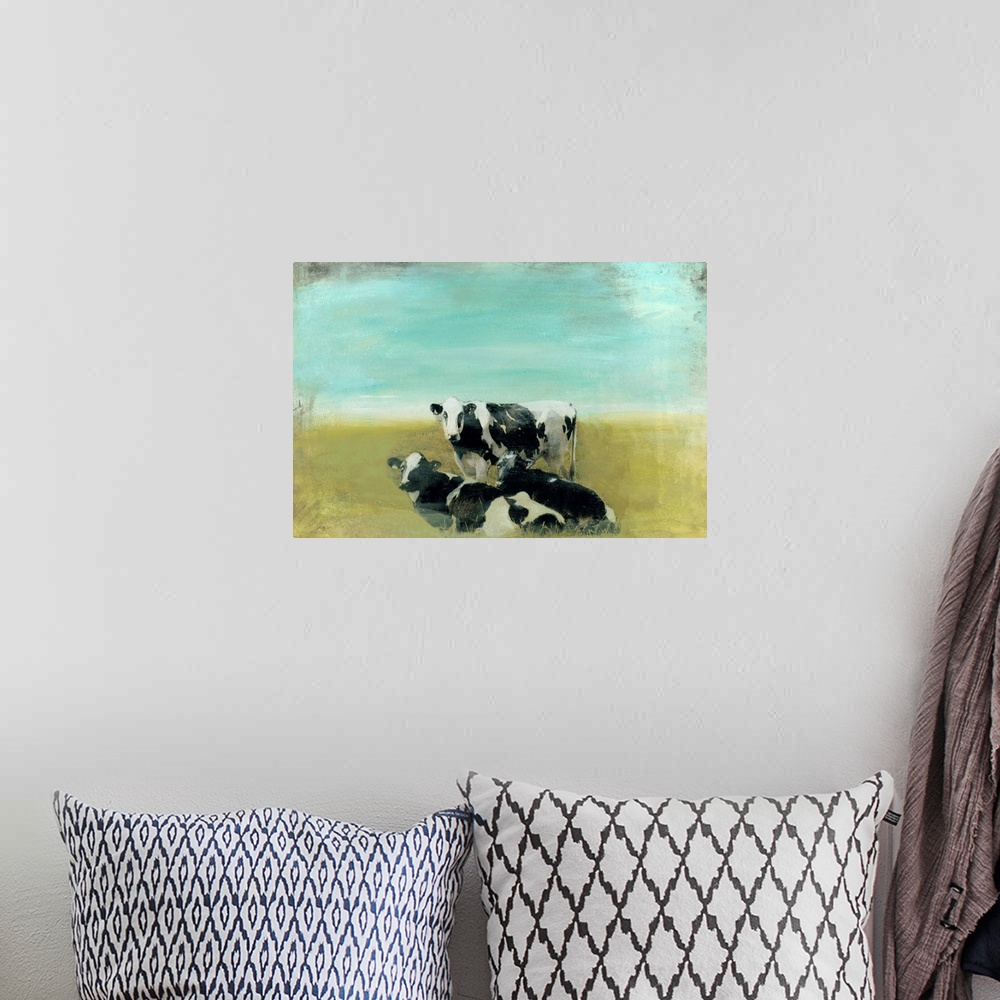 A bohemian room featuring Contemporary painting of black and white cows grazing in a green field.
