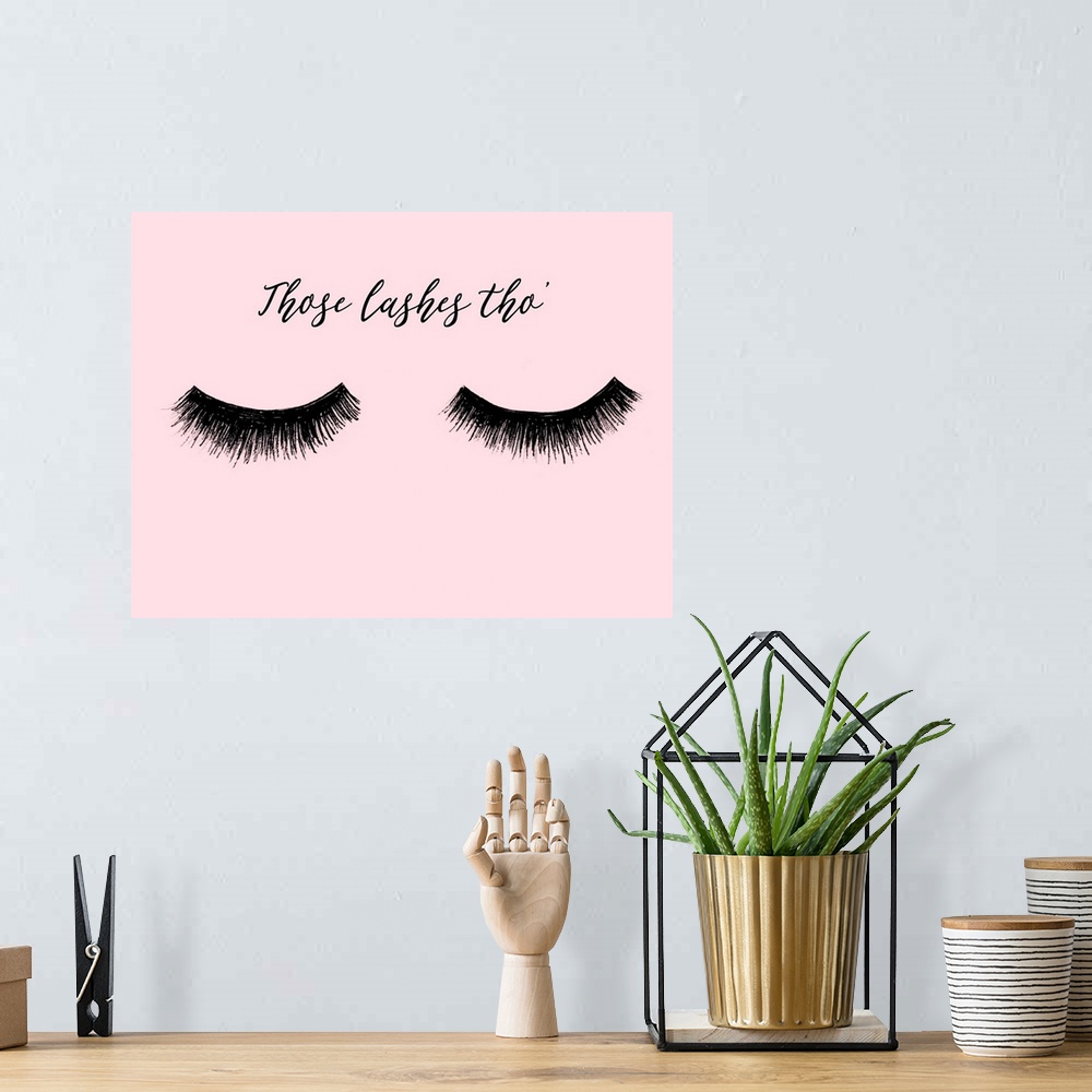A bohemian room featuring "Those Lashes Tho" with eyelashes in black on a pink background.