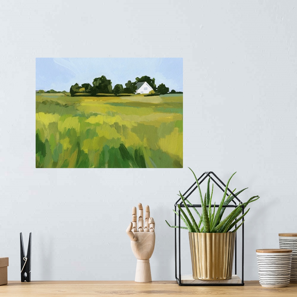 A bohemian room featuring A simple contemporary painting of a field of tall grasses with a white house in the distance. The...