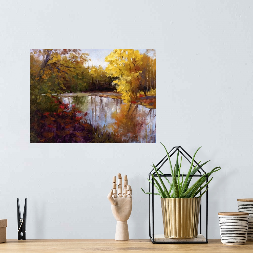 A bohemian room featuring Contemporary painting of a river through a fall forest landscape.