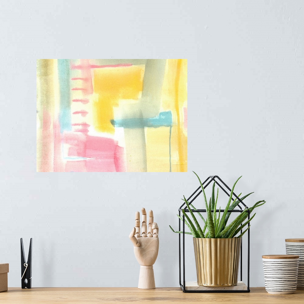 A bohemian room featuring Pastel abstract watercolor artwork in blended shapes of pink, grey, teal, and yellow.
