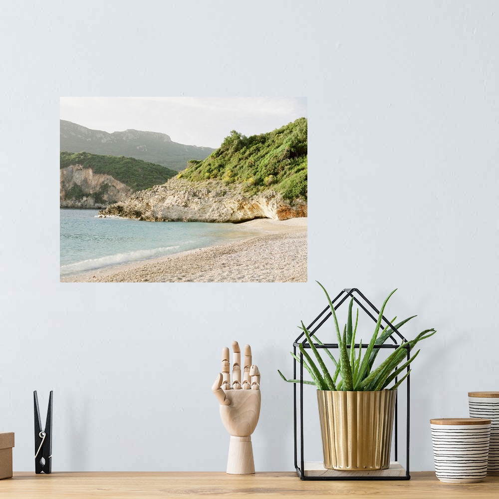 A bohemian room featuring Photograph of a rocky beach, Corfu, Greece.