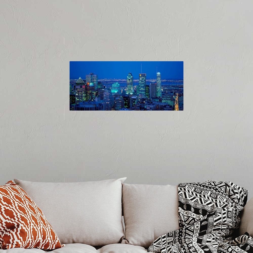 A bohemian room featuring Montreal, Quebec, Canada, April 20, 2001. City skyline at dusk..Photo:Alberto Biscaro