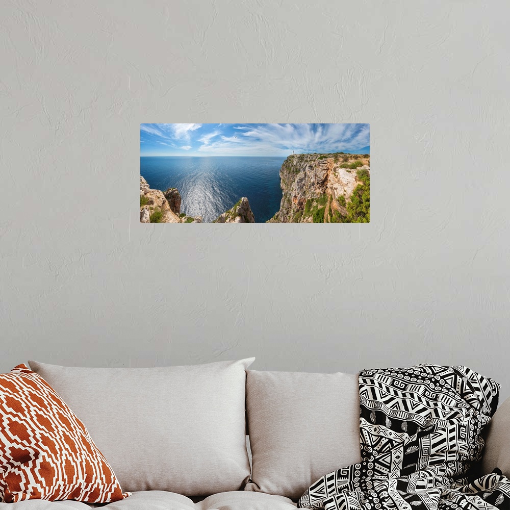 A bohemian room featuring Spain, Balearic Islands, Mediterranean sea, Formentera, Far de la Mola Lighthouse.