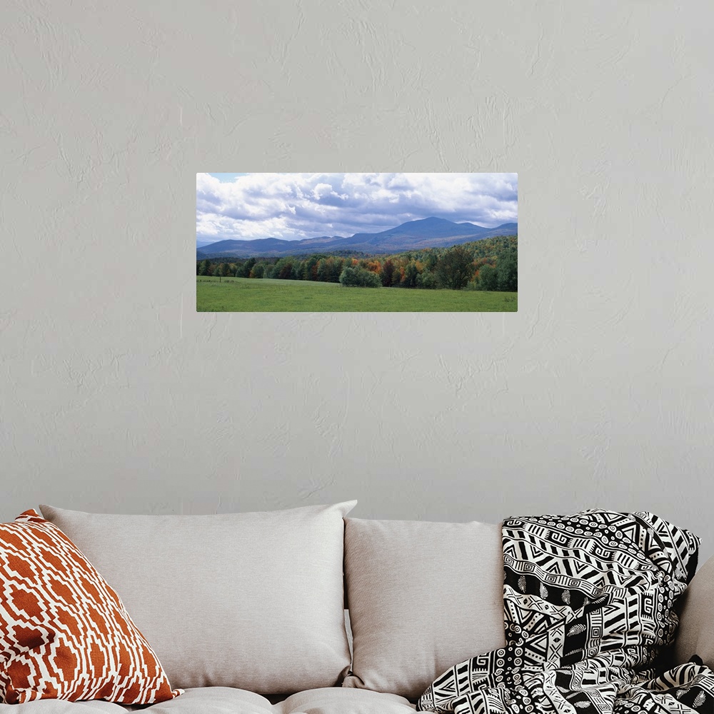 A bohemian room featuring Clouds over a grassland, Mt Mansfield, Vermont
