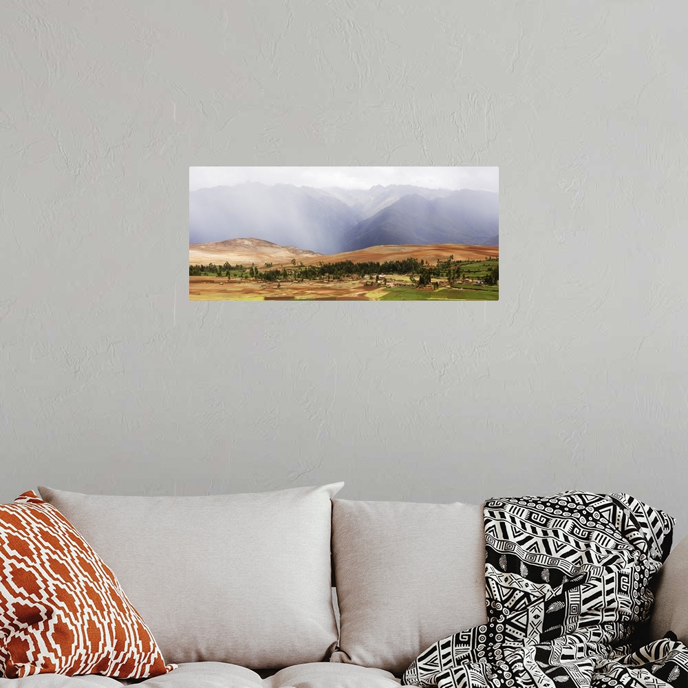 A bohemian room featuring Clouds over mountains, Andes Mountains, Urubamba Valley, Cuzco, Peru