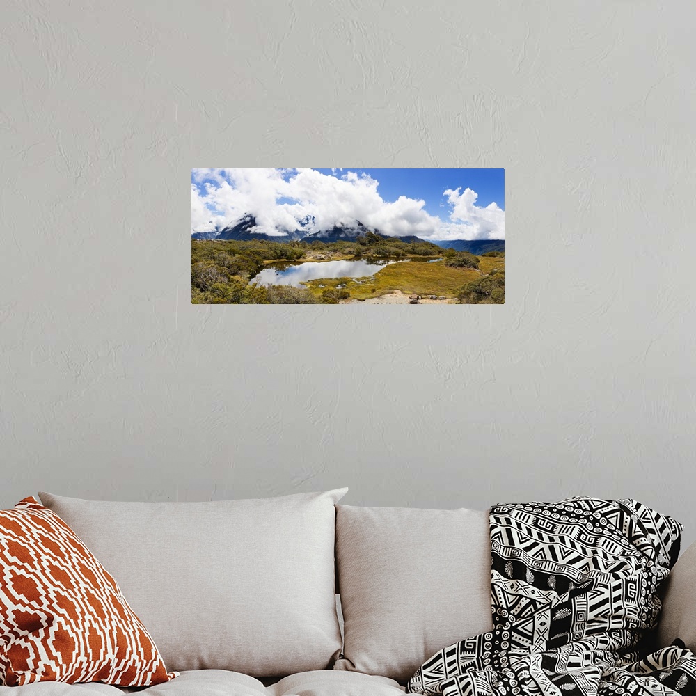 A bohemian room featuring Clouds over mountains, Key Summit, Fiordland National Park, South Island, New Zealand