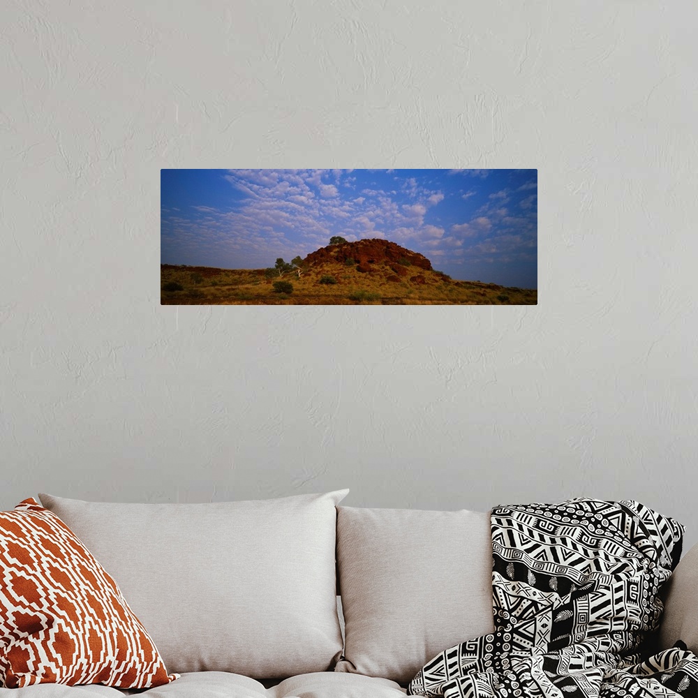 A bohemian room featuring Rock formation on a landscape, The Pilbara, Western Australia, Australia