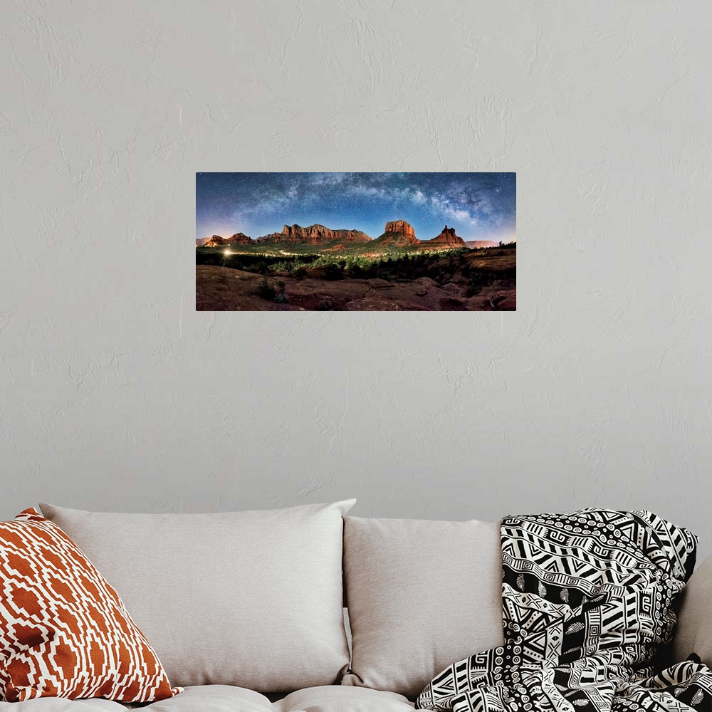 A bohemian room featuring Milky Way panorama above the rred rocks of Sedona, Arizona.