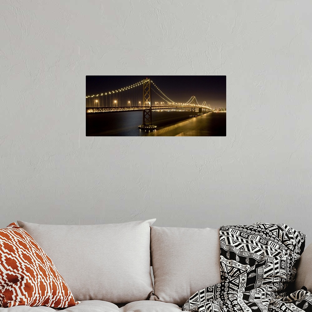 A bohemian room featuring The Oakland Bay Bridge and San Francisco skyline