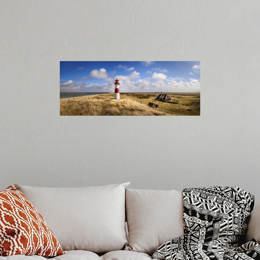A bohemian room featuring List-Ost lighthouse on the Ellenbogen Peninsula, Sylt, Schleswig-Holstein, Germany.