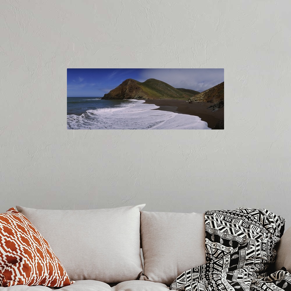 A bohemian room featuring Surf on the beach, Tennessee Valley, Marin County, California