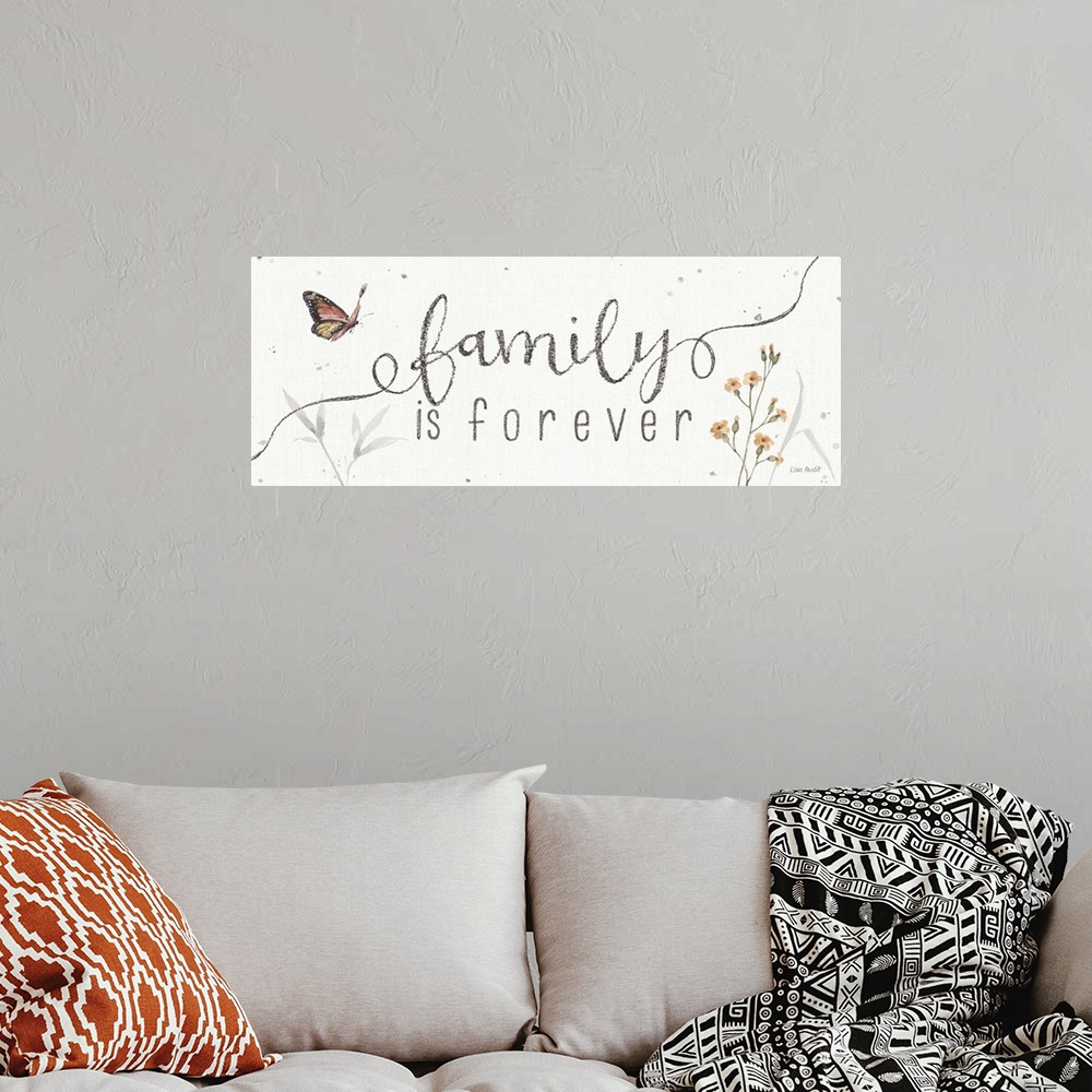 A bohemian room featuring Decorative artwork featuring the words, 'family is forever'.
